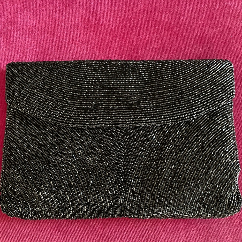 Woman’s Black Beaded Evening Clutch